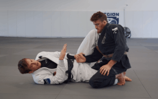 Lasso tilt sweep from half guard - Lesson Featured Image