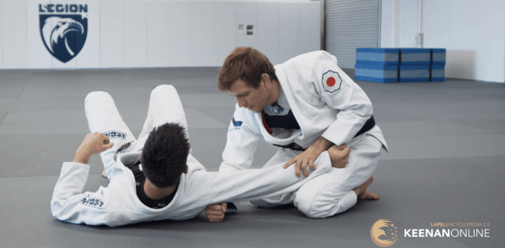 your-hips-serve as-a-block-under-the-armbar